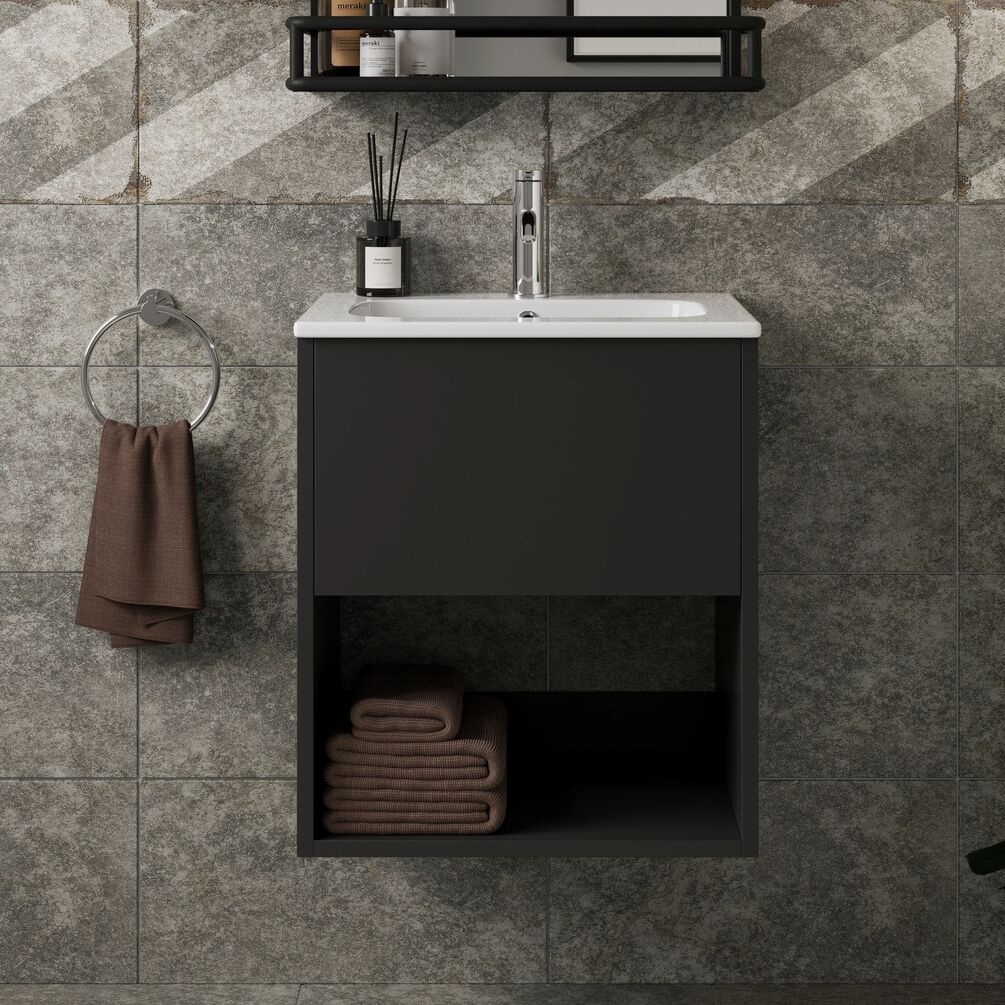 Lifestyle image of the Britton Hackney Matt Black 500mm Wall Hung Vanity Unit & Basin mounted on a bathroom wall with basin mixer & towel ring.